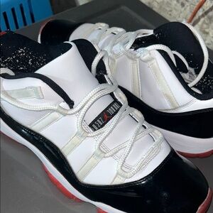 Black and White Sneakers with Red Accents